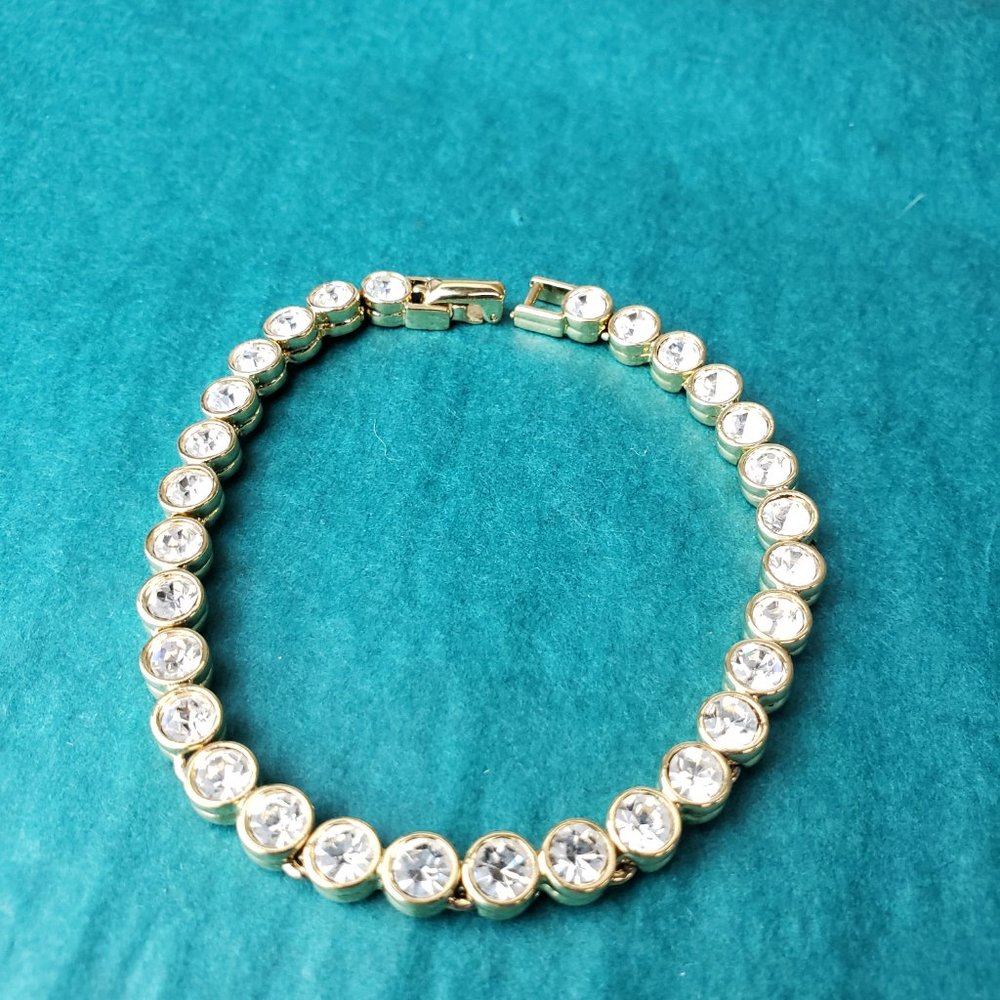 2/60$ Vintage D'orlan gold tone and white rhinestone bracelet